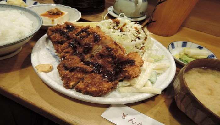 かつ石